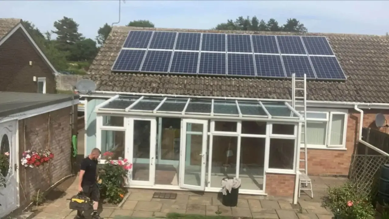 Completed modern anthracite Firestone EPDM warm roof with a sleek Korniche glass roof lantern installed on a Stalham property by Norfolk Exterior Solutions